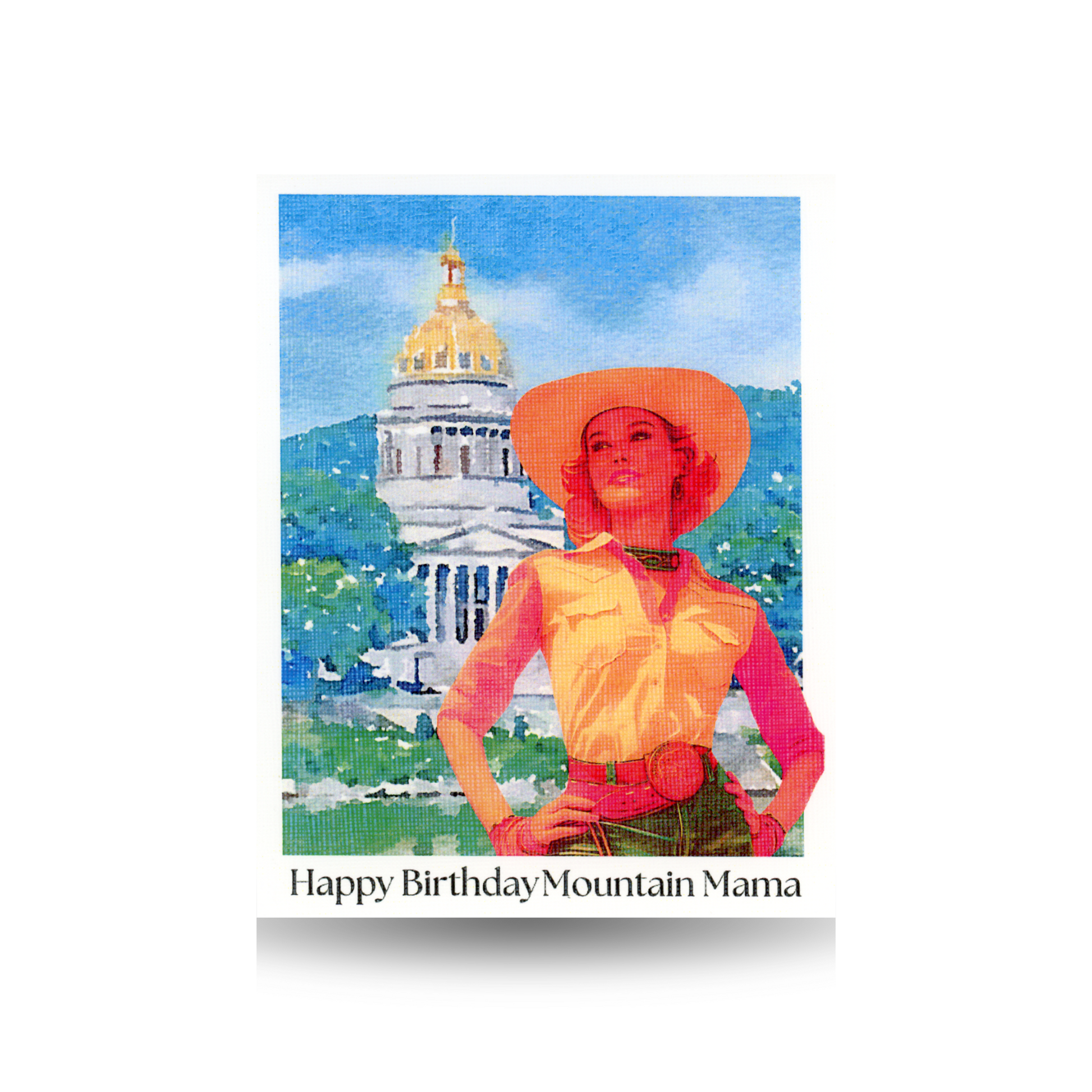 This birthday card features the West Virginia Capitol in Charleston, West Virginia in the background in watercolor-like hue, with a vintage cowgirl standing in front with her hands on her hips.  The greeting "Happy Birthday Mountain Mama" is printed below the scene at the bottom of the card