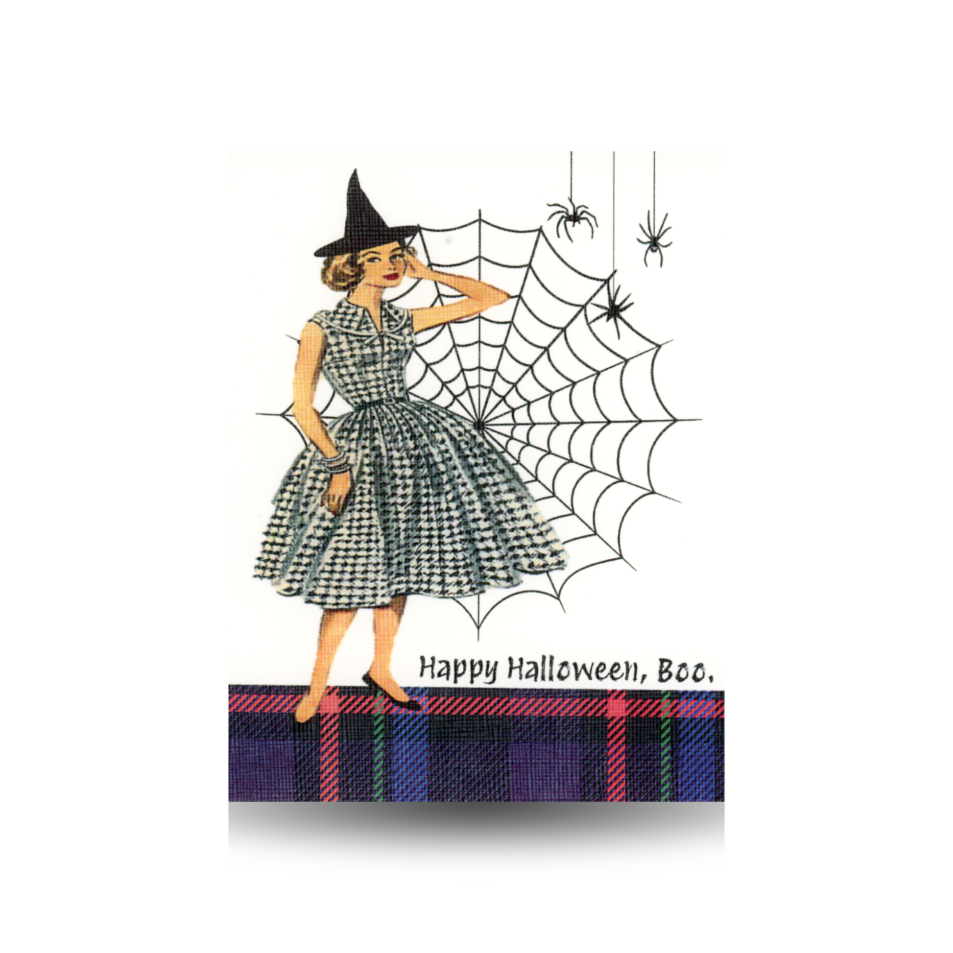 This "Happy Halloween, Boo" greeting card features a vintage lady in a black and white checked dress, standing in front of a huge spider web with spiders dangling.  She is wearing a witches' hat.  She is standing on a black and purple plaid bottom of the card and the greeting appears to the right of the lady.