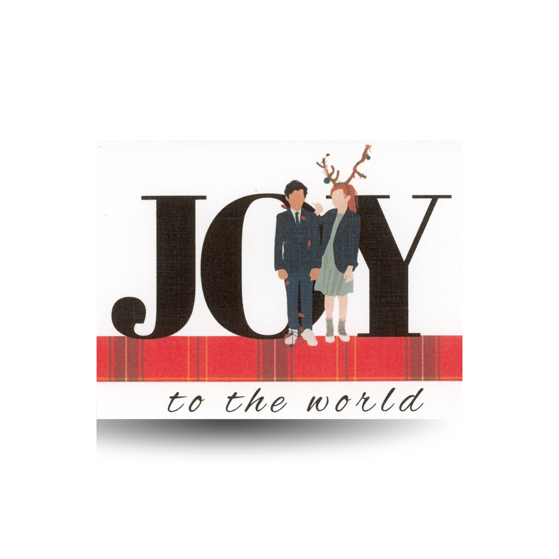 This Christmas card features an oversized "JOY" with two kids standing in front of it.  The boy has Christmas lights around him and the girl is wearing deer antlers on her head.  The background is white and they are standing on a read plaid floor.  The full message is "JOY to the world"