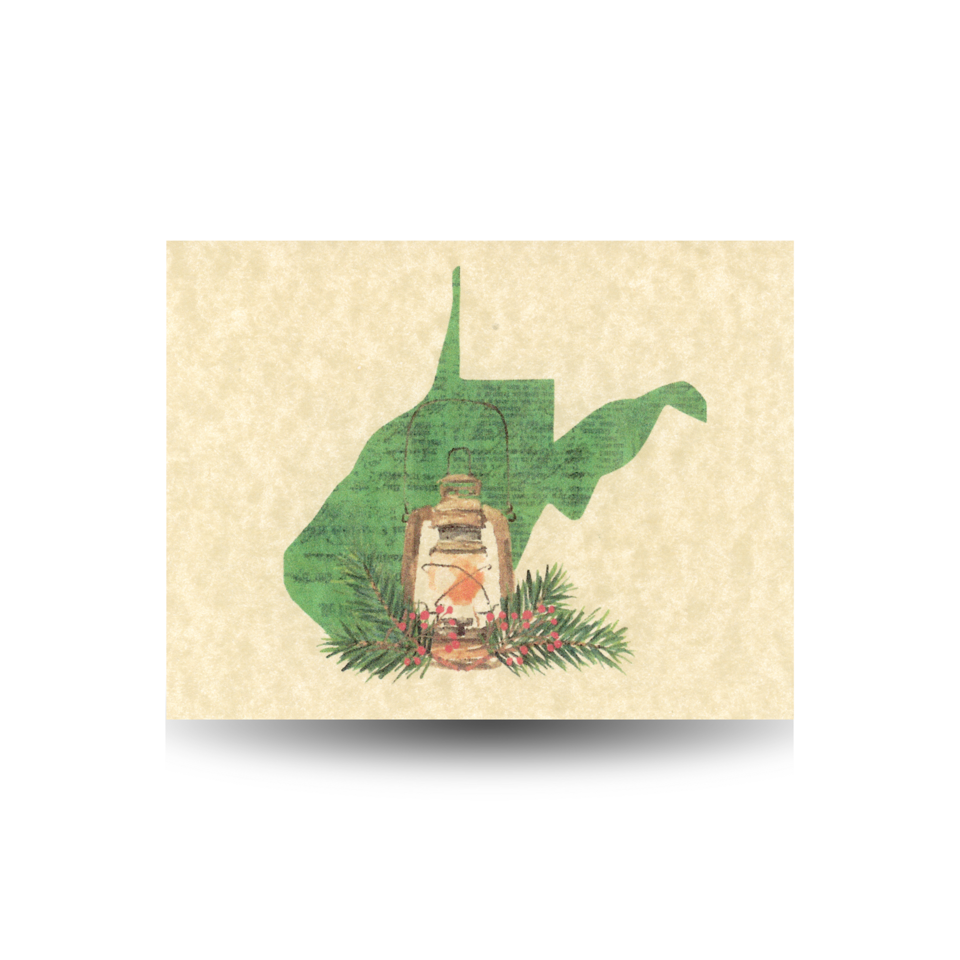 This note card features a green West Virginia state outline with a lantern sitting at its base, surrounded by pine and berries.  It is printed on tan parchment paper